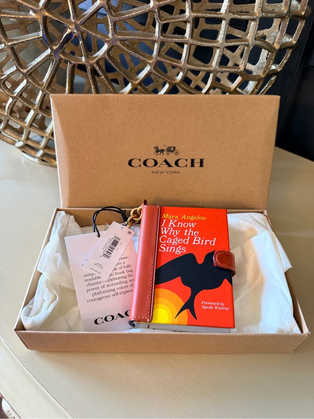 Coach I Know Why The Caged Bird Sings Maya Angelou Book Bag Charm CFK42 NWT